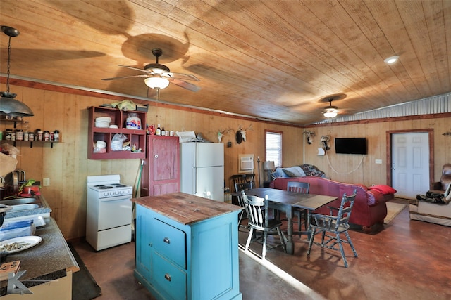 kitchen with wooden walls, wood ceiling, white appliances, ceiling fan, and hanging light fixtures