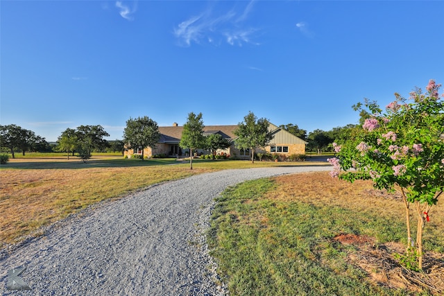 exterior space featuring a front lawn