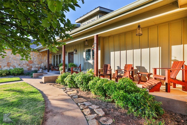 doorway to property with a porch