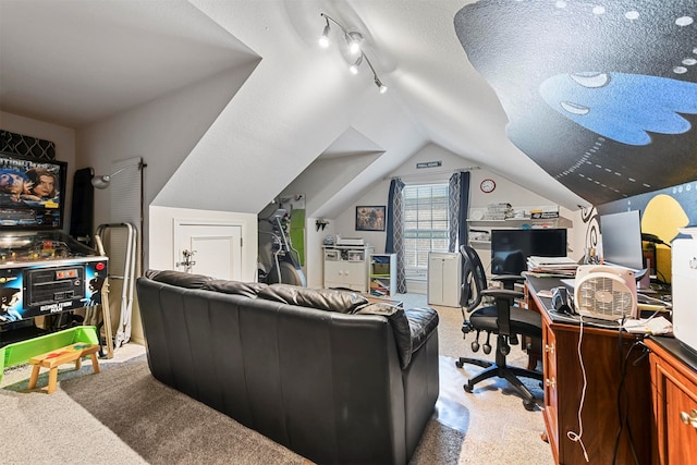 interior space with a textured ceiling and vaulted ceiling