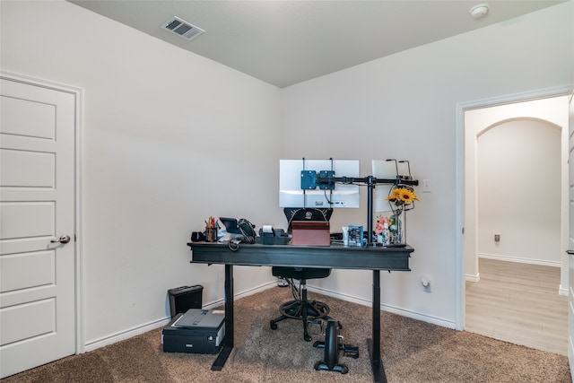 home office featuring hardwood / wood-style floors