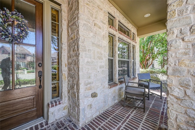 property entrance with covered porch