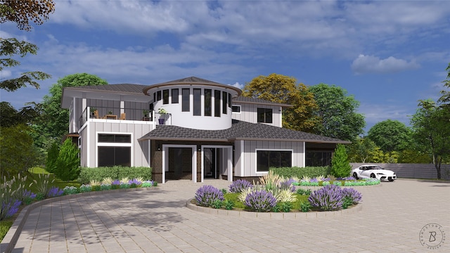 view of front of home with a balcony