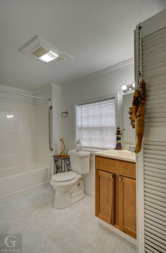 bathroom with ornamental molding, a textured ceiling, vanity, and bathing tub / shower combination