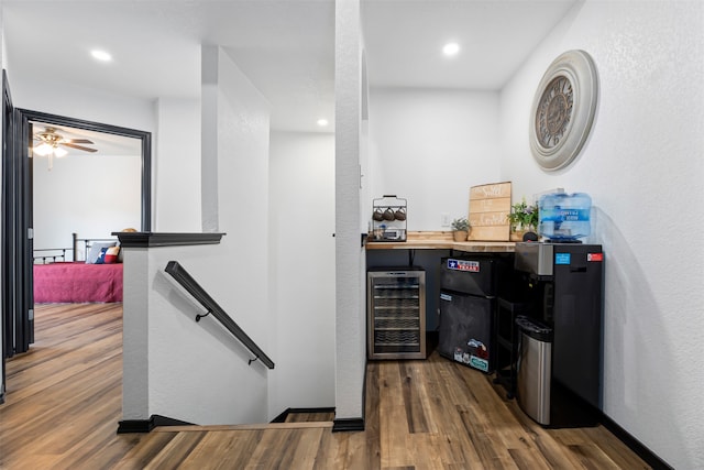 interior space with hardwood / wood-style flooring and wine cooler