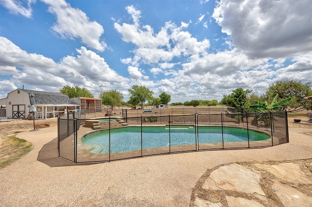 view of swimming pool featuring a patio