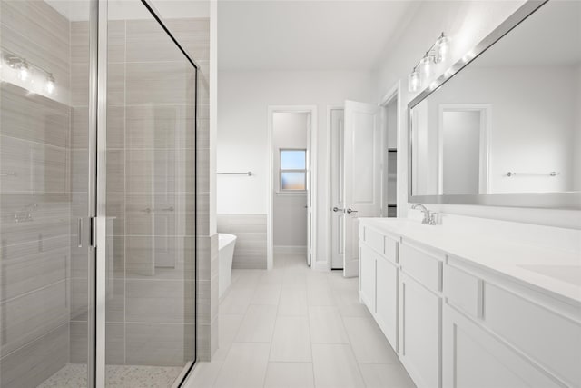 bathroom with vanity, separate shower and tub, and tile patterned flooring