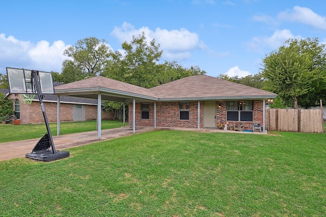 view of front of home with a patio area and a front lawn