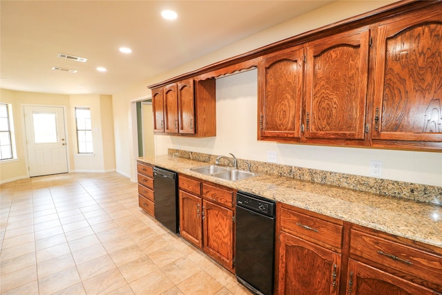 kitchen featuring baseboards, visible vents, dishwasher, a sink, and recessed lighting