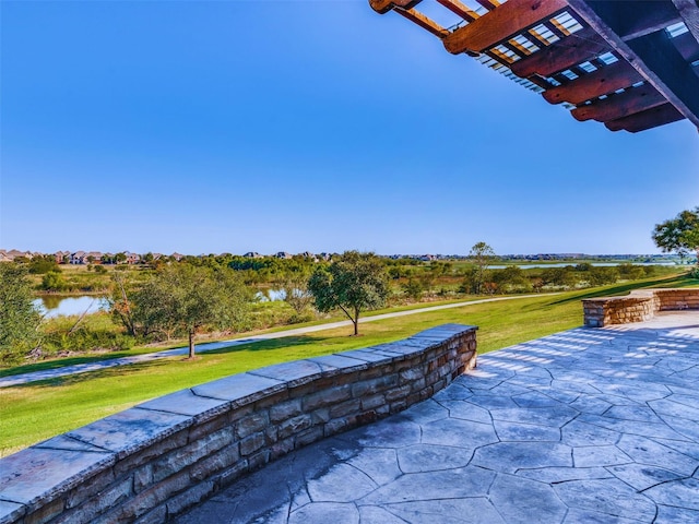 view of patio / terrace featuring a water view