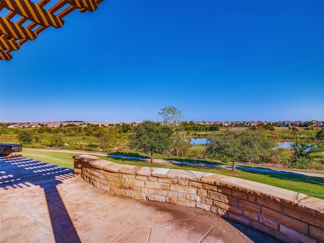 view of patio / terrace with a water view