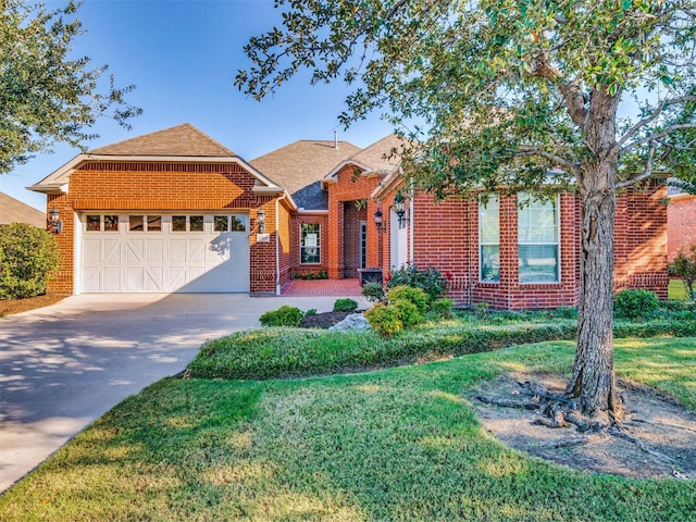 view of front facade featuring a front lawn and a garage