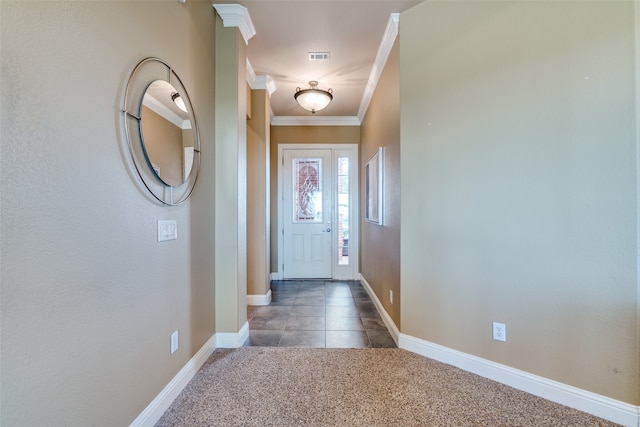 doorway to outside featuring dark carpet and ornamental molding