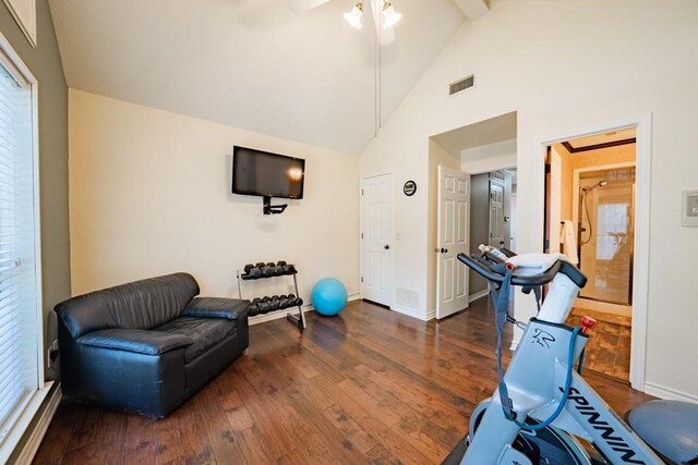 sitting room featuring high vaulted ceiling, ceiling fan, beamed ceiling, and dark hardwood / wood-style floors