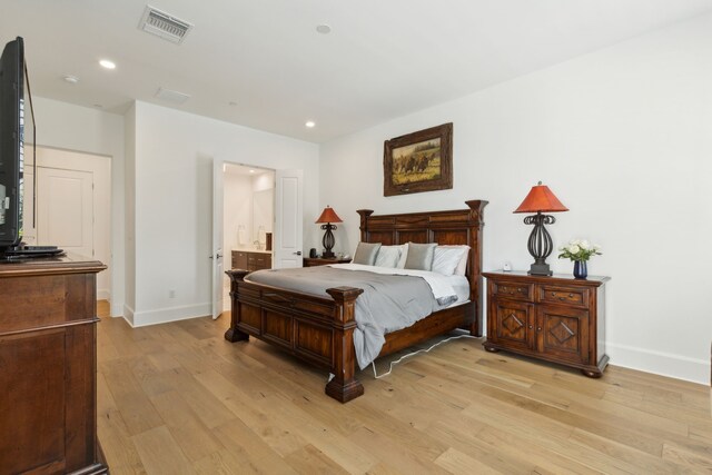 5270 Town And Country Blvd Unit 113, Frisco, TX 75034 - bedroom featuring light wood-style floors, baseboards, visible vents, and recessed lighting