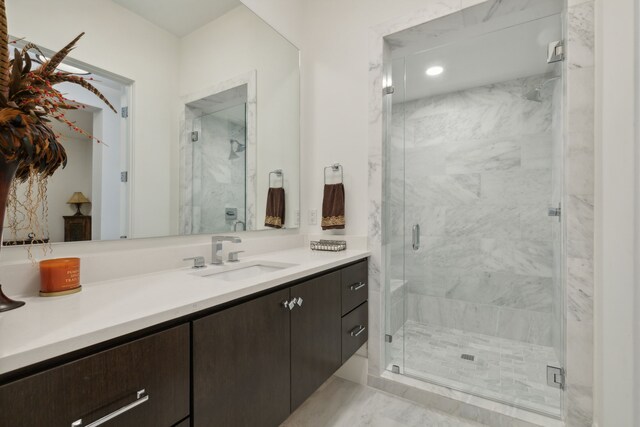 5270 Town And Country Blvd Unit 113, Frisco, TX 75034 - bathroom featuring a shower stall, vanity, and recessed lighting