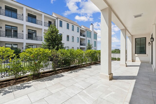 5270 Town And Country Blvd Unit 113, Frisco, TX 75034 - view of patio with fence and visible vents