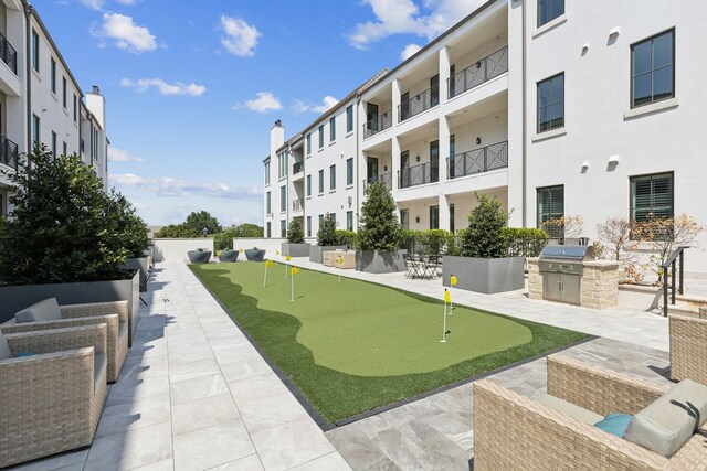 5270 Town And Country Blvd Unit 113, Frisco, TX 75034 - view of home's community with a patio area and an outdoor kitchen