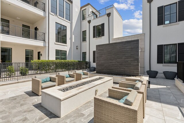 5270 Town And Country Blvd Unit 113, Frisco, TX 75034 - view of patio / terrace with an outdoor living space with a fire pit