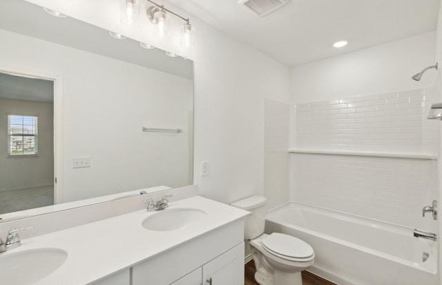 full bathroom with vanity, shower / bath combination, toilet, and hardwood / wood-style flooring