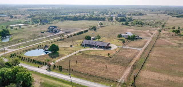 birds eye view of property featuring a rural view