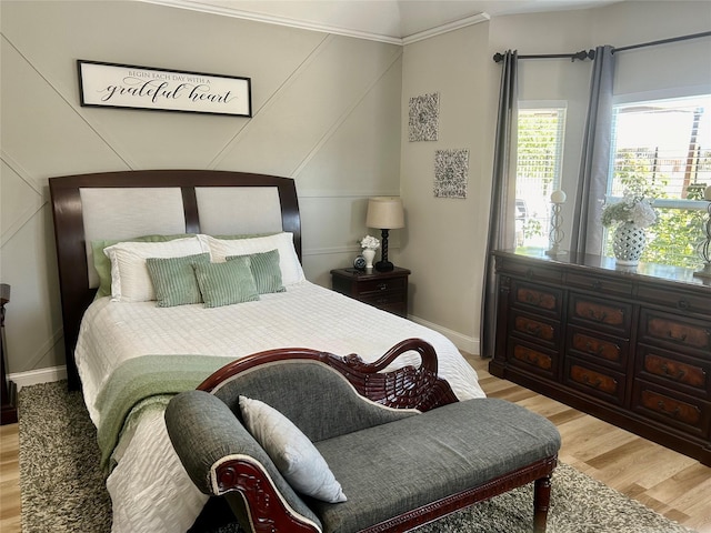 bedroom with light hardwood / wood-style floors