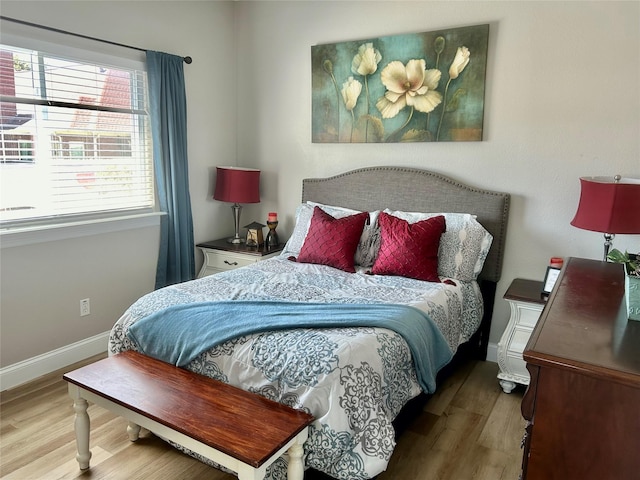 bedroom featuring hardwood / wood-style floors