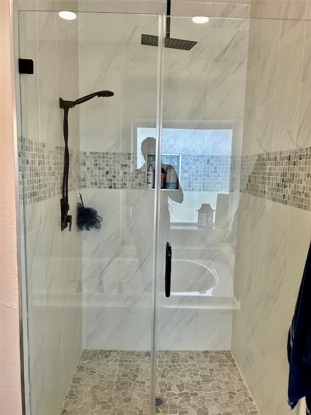 bathroom featuring walk in shower