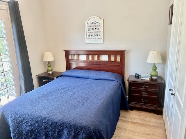 bedroom featuring light wood-type flooring