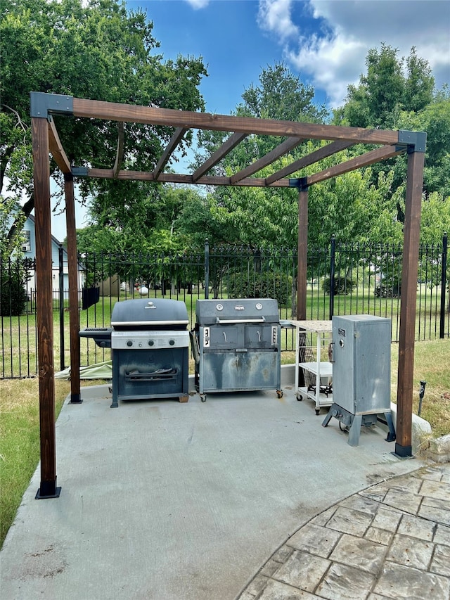 view of patio / terrace with a pergola and a grill