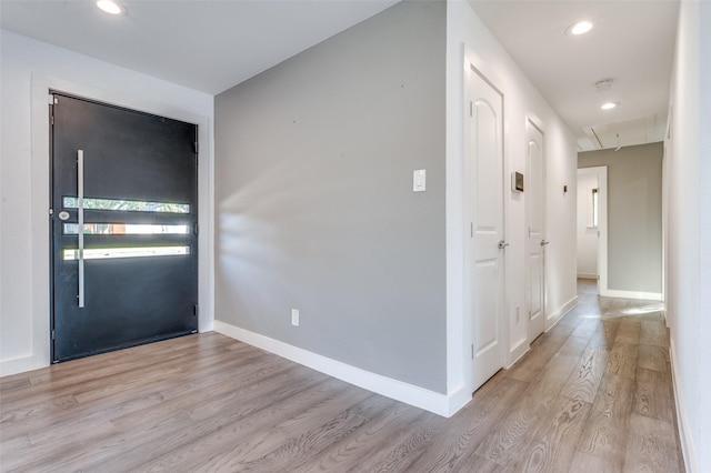 entrance foyer featuring light wood-type flooring