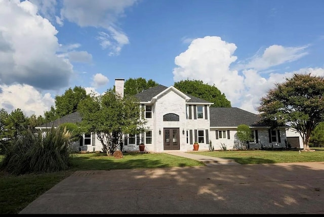 view of front of house featuring a front yard