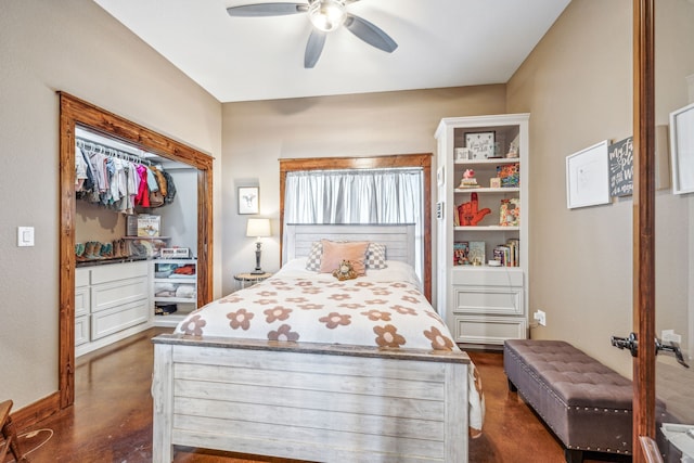 bedroom with a closet, ceiling fan, and dark hardwood / wood-style flooring