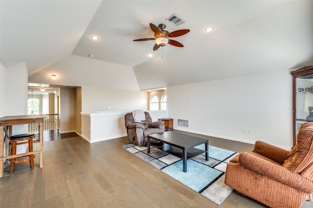 living room with lofted ceiling, a healthy amount of sunlight, ceiling fan, and wood-type flooring