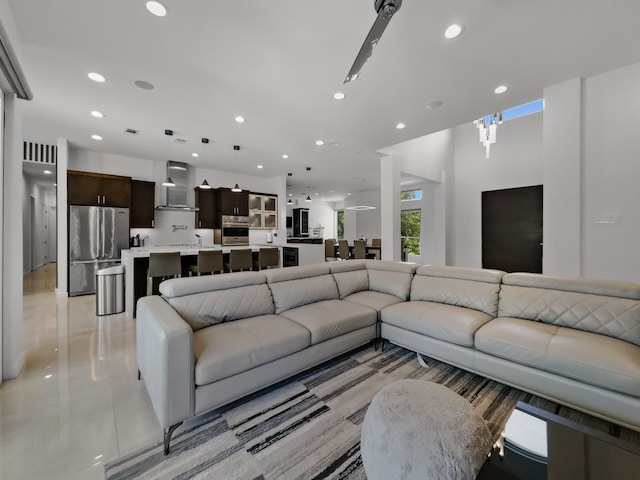 living room with light tile patterned floors