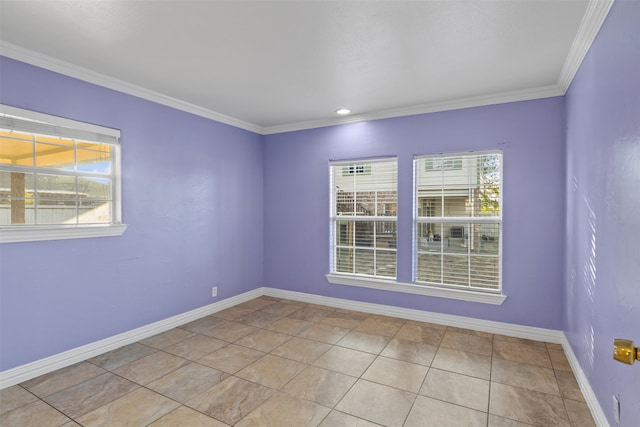 tiled spare room with crown molding and plenty of natural light