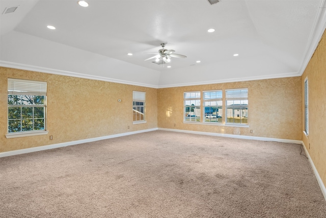 unfurnished room with ceiling fan, carpet flooring, and crown molding