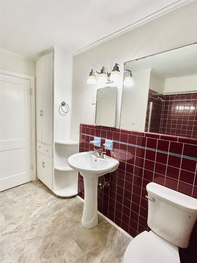 bathroom with tile walls, toilet, decorative backsplash, and tile patterned floors