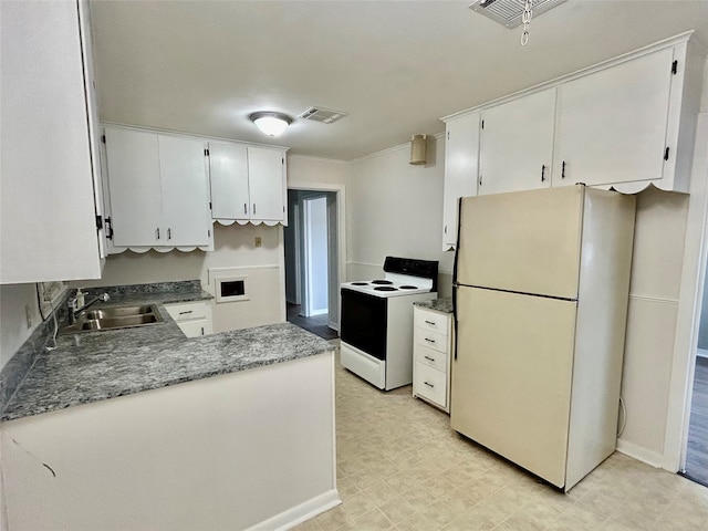 kitchen featuring light tile patterned flooring, sink, white appliances, and white cabinets