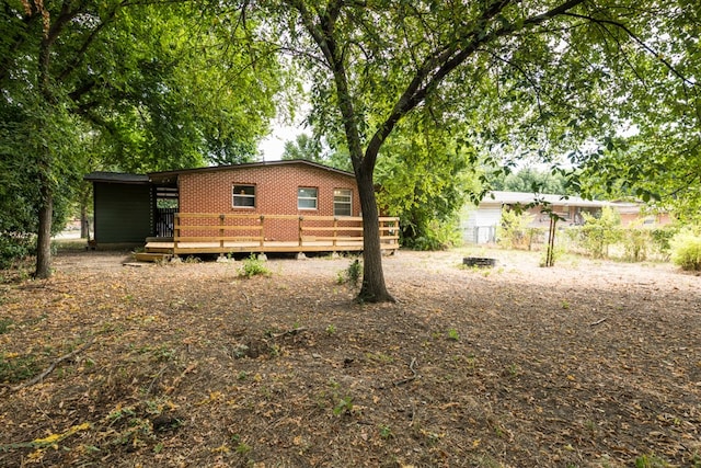 exterior space featuring a wooden deck