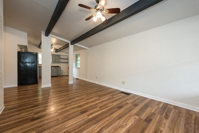 unfurnished living room featuring dark wood-type flooring, ceiling fan, and lofted ceiling with beams