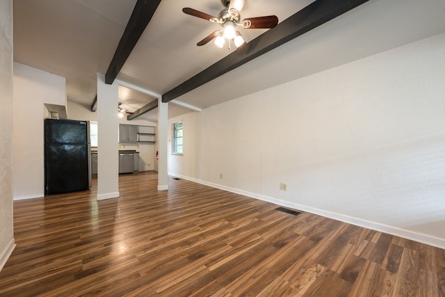 unfurnished living room featuring lofted ceiling with beams, dark hardwood / wood-style floors, and ceiling fan