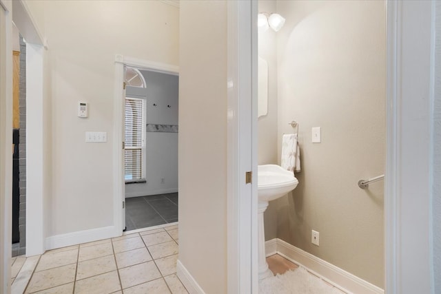 bathroom with tile patterned floors