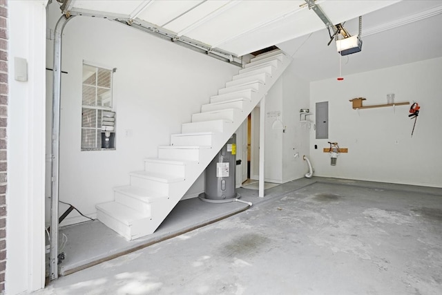 garage featuring electric panel, electric water heater, and a garage door opener