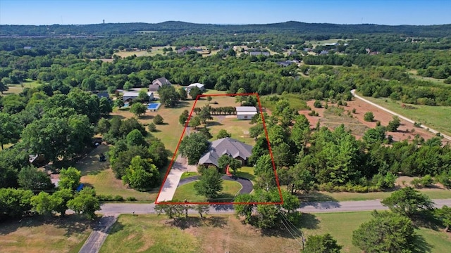 birds eye view of property featuring a mountain view