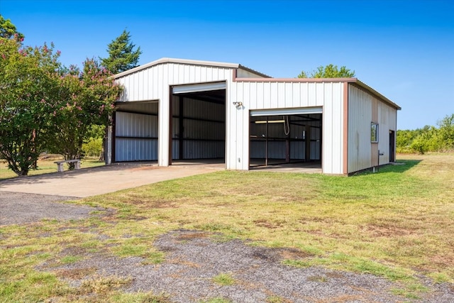 garage with a yard