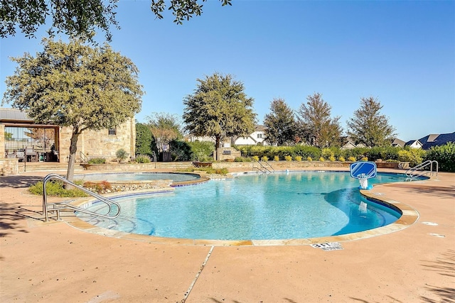 pool featuring a patio