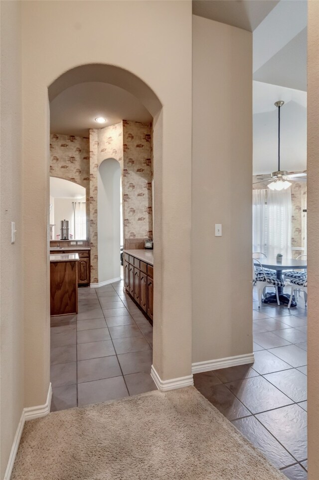 corridor featuring tile patterned floors