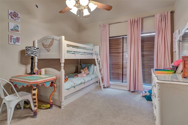 bedroom with a ceiling fan and carpet floors