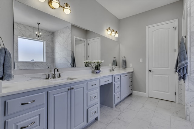 bathroom featuring tile patterned flooring and vanity